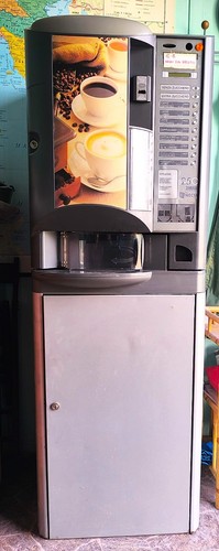 Distributore automatico - , di